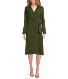 From Alex Marie&#x2C; this dress features: Heavyweight Crepe de Chine fabrication Pointed collar V-neckline Long sleeves Cuffed sleevesSide self  tie at waistlineFitted faux wrap dress silhouetteStraight hemline Midi dress length Polyester Machine wash on cold&#x2C; wash with similar colors&#x2C; wash with similar fabrications&#x2C; promptly remove from wash&#x2C; hang on line to dryImported. Green Viscose Dress For Fall, Olive Knee-length Dresses For Work, Elegant Olive Dress For Date Night, Green V-neck Wrap Dress For Fall, Elegant Long Sleeve Olive Dress, Elegant Olive Knee-length Dress, Olive Fitted V-neck Dress, Olive Midi-length Dress For Fall, Elegant Olive Midi Dress For Spring