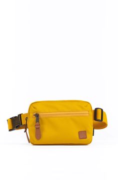 a yellow fanny bag on a white background with the strap down to it's front pocket