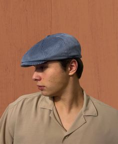 Step into timeless elegance with our Blue Velvet Newsboy Cap, a luxurious masterpiece inspired by the iconic Peaky Blinders and vintage 1920s fashion. Handmade with care, this unique blue 8 panels cap is more than a hat; it's a statement piece that marries classic charm with contemporary style. Discover The Versatility Of Our Hat: -Velvet texture for a touch of luxury -Classic 8 panels design with a nod to the Peaky Blinders era -Handmade with high-quality materials for superior craftsmanship -Versatile baker boy hat suitable for winter fashion -Ideal flat cap for men seeking both warmth and style -Vintage wool hat reminiscent of 1920s fashion Discover the sophistication of our ladies' vintage hat, crafted to add a unique flair to your winter wardrobe. This newsboy cap, also an Irish flat Classic Blue Six-panel Hat, Classic Blue Cap Hat, Peaky Blinders Cap, Peaky Blinders Hat, Panels Design, 1920s Hat, Flat Cap Men, Baker Boy Hat, Velvet Texture