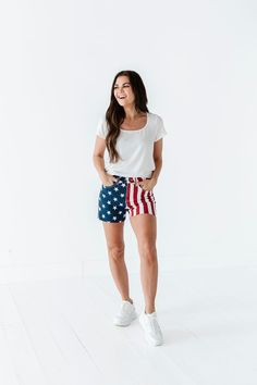 Features High rise Frayed hem Zipper fly Flag print: blue with white stars; red and white stripes 93% Cotton, 6% Polyester, 1% Spandex Size + Fit Kristin is 5'4", a size 1 and is wearing a Small Ashley is 5'6", a size 18 and is wearing a 1X Small 2-4, Medium 6-8, Large 10-12, X-Large 14-16, 1X 16-18, 2X 18-20, 3X 20-22 True to size. Do have stretch, but do not lose shape. Waist measurements are taken while laying flat and doubled. Curvy sizes have more room in the waist Click here for white top Cotton Bottoms With Star Print And Short Length, Casual Cotton Shorts With Star Print, Cotton Bottoms With Star Print, Short Length, Cotton Bottoms With Star Print In Short Length, Spring Cotton Bottoms With Star Print, Cotton Bottoms With Star Print For Spring, Spring Star Print Cotton Bottoms, Spring Cotton Shorts With Star Print, Cotton Star Print Shorts For Spring