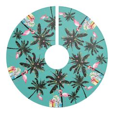 a blue christmas tree skirt with pink flamingos and palm trees