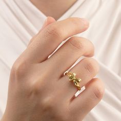 14k Gold Ribbon Ring | Genuine Solid Gold Ring | Ribbon Shape Gift For Her ➤ Ring Details * 14k / 18k Yellow Gold or Yellow Sterling Silver * Gold Color Options; 14K / 18k White, Yellow, Rose Gold * Sterling Silver Color Options; Yellow, Rose, White * Top Width: 9 mm * Top Length: 9 mm * Band Width: 1.90 mm * Band Thickness: 1.45 mm * Ready to Ship 3-5 Business Days 💍 ISEA Jewels' pieces are handcrafted by 10-15 years of experienced craftsmen and made to order in a very short time. 🎁 All pieces come in a quality and hygienic suede gift box enclosed in a pouch. 🌎 Our products arrive worldwide within 6 working days. ❓ Questions, comments, or just want to say hi? We are glad to hear from our customers and are always quick to respond. Reviews are always appreciated ✨ 💫 Find out more about Bow Gold Ring, Yellow Gold Diamond Ring For Valentine's Day Gift, Yellow Gold Flower Ring With Birthstone For Gift, 14k Gold Open Flower Ring For Anniversary, 14k Gold Hallmarked Flower Ring As Gift, Hallmarked 14k Gold Flower Ring For Gift, Hallmarked 14k Gold Flower Ring As Gift, Yellow Gold Rings For Valentine's Day Gift, Gold 14k Birthstone Ring As Gift