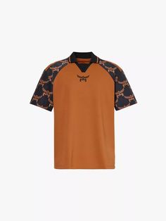 an orange and black shirt with chain print on the chest, short sleeves and collar