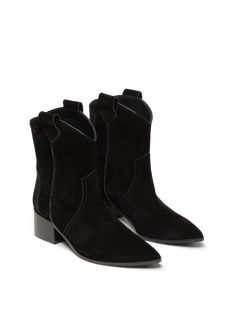 A Western bootie made the Italian way, The Rita Basso is handcrafted from luxuriously soft suede. From the smooth leather piping and tonal stitching to the hand-painted welt, every inch is thoughtfully considered for both style and utility. The mid-calf shaft and mid-height heel mean it pairs well with of-the-moment midi dresses and wide-legged jeans. Western Mid-calf Suede Boots With Suede Lining, Western Mid-calf Suede Boots, Fall Suede Moto Boots With Leather Lining, Fall Suede Boots With Leather Lining, Western Leather Heeled Boots With Suede Lining, Snip Toe Suede Boots With Suede Lining, Fall Suede Booties With Leather Sole, Fall Leather Boots With Suede Overlays, Western Suede Heeled Boots With Leather Sole