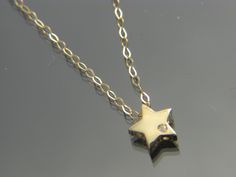 Sterling Silver Star Charm Necklace In Yellow Gold, Yellow Gold Sterling Silver Star Charm Necklace, Yellow Gold Star Necklace Gift, 14k Gold Star Necklace As Gift, 14k Gold Star Necklace For Gift, 14k Gold Star Necklace Perfect For Gifts, Gold Star-shaped Sterling Silver Charm Necklace, Gold Star Charm Necklace In Sterling Silver, 14k Gold Star Charm Necklace