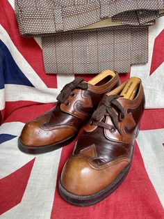 "Cracking pair of early 1970s light tan dark brown brogue platform shoes with just over a 2&1/4\" stacked heel. Light signs of wear of which you can clearly see so please study,slight wear to back of heel. Nice stitching detail to the uppers. Weather you are into Bowie,Slade,Roxy music,are a soul boy,suedehead,boot boy or bovver boy these would have been so popular in the day with some Oxford bags or flares. Uk size 7.5 Please check out my other amazing shoes. My Generation Vintage on Facebook and instagram" 60s Shoes Men, 70s Fashion Men, 1970s Shoes, 60s Shoes, 70s Shoes, Brown Brogues, 1970s Men, Oxford Bags, My Generation