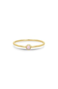 A bezel-set opal glints gently from a simple, stackable setting handcrafted in 14-karat gold. 1/8" setting diameter 14k gold/opal Made in the USA Opal Stacking Ring, Zoe Chicco, Stacking Ring, Stacking Rings, Bezel Setting, Made In The Usa, Opal, Yellow Gold, Nordstrom