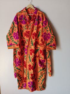 Suzani Kimono, Style Coat, 100% Cotton Kimono, Shot Jacket, Winter Coat, Hand Embroidered Jacket, Gift For Her Suitable for Day and Night Wear: Looks Great with the Belt aswell and Great Styling Tip as a dinner Close and open jacket. Measurement Approx: Length: 50'' inch (128 cm) Chest: 50" inch (128 cm) Fabric: 100% cotton and wool thread (handmade in India) New Suzani Style Jacket, This Jacket Also has Two Pocket's What You Can See In The Photo There may be a slight difference between the product and the photo in lising This piece is hand embroidered with wool thread and hand stitched in a very small batch. Pls note the Base color is Desert Sand White. It's not a light weight jacket. Jacket made with NEW SUZANI kantha quilt fabric which is fresh and new. This kantha fabric is hand stitch Women Kimono, Kimono Style Jacket, Kantha Fabric, Open Jacket, Wool Thread, Style Coat, Cotton Kimono, Womens Kimono, Night Wear