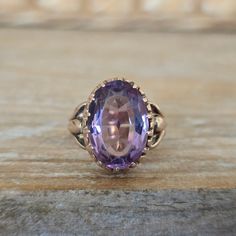 Antique Victorian Amethyst Ring in Rose Yellow Gold | 1800's Statement Ring This gorgeous ring is an 1800's Victorian estate find fashioned from solid 10k gold. It's my favorite color gold which is a combination of rose and yellow. Beautiful mounting holding an oval cut amethyst. This natural gemstone has medium color. It measures approx. 16.4 x 12.3 mm. This ring has lovely work to the sides.  MEASUREMENTS: Face Measurement- 16.4 x 12.3mm Height -5.2 mm  Size - 6 and this can be resized by your jeweler or by ours for an additional fee Weighs - 4.47 grams Markings/Stamps - 10 in a circle (see photo) Condition- Very Good commensurate with age of this piece. Note in the video there is some minor surface wear on the amethyst as expected in a piece of this age.  Dating - Late 1800's ✦ Ring Res Luxury Yellow Gold Victorian Amethyst Ring, Buttercup Ring, 1800s Jewelry, Victorian Estate, My Favorite Color, Rose Yellow, Amethyst Ring, Antique Victorian, 10k Gold