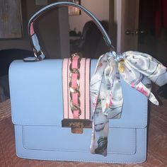 Brand New. Light Blue And Pink Original Stuffing And All Inside Purse. Very Great And Rare Colors Blue Top Handle Shoulder Bag For Spring, Blue Satchel Shoulder Bag For Spring, Blue Satchel For Daily Use In Spring, Blue Satchel For Everyday Spring Use, Blue Trendy Satchel For Spring, Trendy Blue Satchel For Summer, Trendy Blue Satchel For Spring, Blue Rectangular Bags For Spring, Trendy Light Blue Bag With Detachable Handle