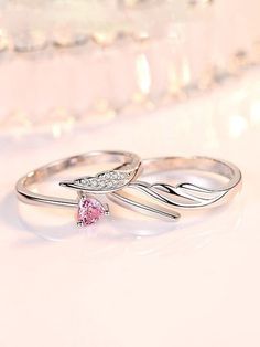 Set Of 2 silver-plated finger-ringSilver-plated adjustable finger ring, has white & pink stone-studded and heart-shaped detailsSilver-plated adjustable finger ring, has white & pink stone-studded and feather-shaped details Size & Fit Circumference: 5.94 cmDiameter: 1.90 cm each Material & Care Material: Stainless SteelPlating: Silver-platedStone type: Cubic zirconia Care Instructions: Wipe your jewellery with a soft cloth after every use Always store your jewellery in a flat box to avoid accidental scratches Keep sprays and perfumes away from your jewellery Do not soak your jewellery in water Clean your jewellery using a soft brush, dipped in jewellery cleaning solution only Dispatch within 7 days Heart Promise Rings, Ring Trends, Silver Jewelry Fashion, Matching Rings, Tungsten Ring, Pink Ring, Couple Rings, Girls Jewelry, Love Ring