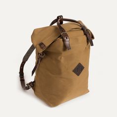 Canvas and Leather Backpack - Outdoor Inspiration | Bleu de chauffe Brown Outdoor Backpack With Adjustable Straps, Outdoor Brown Backpack With Adjustable Straps, Functional Brown Backpack With Adjustable Straps, Classic Brown Backpack For Outdoor Use, Classic Brown Backpack For Outdoor, Beige Satchel Backpack For Outdoor, Brown Casual Backpack For Adventure, Casual Brown Backpack For Adventure, Casual Bags With Leather Trim For Outdoor Activities