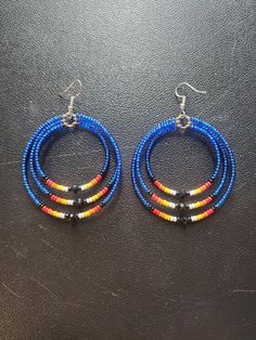 Beaded Hoop Earrings.  #10 Czech beads.  2" in diameter Adjustable Colorful Beaded Round Earrings, Adjustable Hoop Earrings With Colorful Beads, Adjustable Hoop Beaded Earrings With Dangling Beads, Adjustable Hoop Earrings With Dangling Beads, Adjustable Colorful Beaded Circle Hoop Earrings, Adjustable Beaded Hoop Earrings, Adjustable Small Beaded Hoop Earrings, Adjustable Small Hoop Earrings With Dangling Beads, Adjustable Hoop Earrings With Black Beads