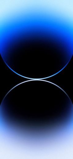 an abstract blue and black background with two circles in the center, one circle is empty