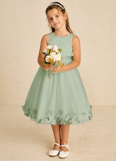 Dot features a charming A-line design crafted from a delightful mix of matte satin and tulle. Its scoop neckline and sleeveless style are complemented by a convenient zipper closure and whimsical bows, creating a playful yet elegant look for any special event. Sage Flower Girl Dress, Green Flower Girl Dresses, Tea Length Flower Girl Dress, Tea Length Tulle, Dusty Sage, Military Ball Dresses, Sage Dress, Special Event Dresses, Lace Bride