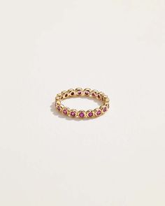 A refresh of the classic eternity band, the bright pop of the rubies and the organic shapes of the molten bezel settings reenergize this iconic jewelry staple. SIZE & MATERIALS Composition: 14k yellow gold, ruby Read about how to care for our jewelry here. Stackable Ruby Eternity Band In Yellow Gold, Yellow Gold Ruby Eternity Band Stackable, Ruby Eternity Band In Yellow Gold Stackable, Yellow Gold Ruby Eternity Band, Iconic Jewelry, Rings Emerald, Elegant Rings, Bright Pop, Jewelry Staples