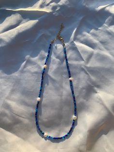 beautiful deep blue beads with freshwater pearls ⭐️💙 All necklaces are about 16-18 inches (unless specified to be longer or shorter) & comes with an attached, adjustable silver chain! :) So you can adjust it to your liking (longer or shorter)🤍 Beach Seed Bead Necklace, Beaded Necklaces, Beads Bracelet, Jewelry Inspo, Deep Sea, Blue Beads, How To Make Beads, Chain Styles, Deep Blue