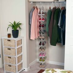 an organized closet with shoes hanging on the rack and baskets under it, along with other items