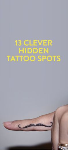 a man with tattoos on his arm and hand pointing to the side that says 13 clever hidden tattoo spots