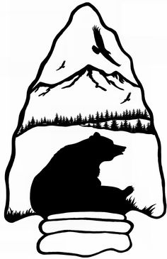 a bear sitting on top of a rock in front of a mountain with birds flying over it