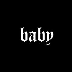 the word baap written in white ink on a black background with an ornate font