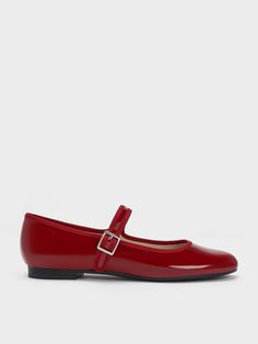 Featuring a glossy patent red finish, these buckled Mary Janes will inject colour and fun into your everyday ensembles. From the familiar feminine silhouette to the comfortable adjustable front straps, these stylish shoes have all the makings of a classic you'll want to wear on repeat. Style them with a little black dress, a statement microbag and a red lip for top marks. Red Mary Jane Shoes, Eyewear Chain, Red Flats, Patent Shoes, Faux Leather Heels, French Women, Charles Keith, Mary Jane Flats, Leather Mary Janes