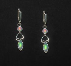 Handmade Opal Drop Earrings, Oval Opal Jewelry With Matching Earrings, Elegant Opal Gemstone Drop Earrings, Opal Gemstone Drop Earrings, Elegant Ethiopian Opal Gemstone Jewelry, Opal Drop Earrings With Gemstones, Handmade Ethiopian Opal Elegant Jewelry, Handmade Teardrop Opal Jewelry, Elegant Pink Opal Jewelry For Formal Occasions