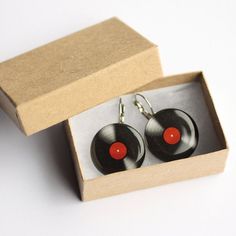 Lovely pair of handcrafted earrings featuring a retro vinyl record. Very retro, very cool accessory. . Made of 100% hypoallergenic SURGICAL STAINLESS STEEL and RESIN. Perfect for everyday wearing to office and for any other occasions. More LP: http://etsy.me/1uIJB2P More MUSIC: http://etsy.me/1tfDdNt More EARRING: dangle: http://etsy.me/1vP6mRa stud: http://etsy.me/Ym7FfT DIMENSIONS - choose your size: 12mm / 17mm / 23mm MATERIALS - glossy, jewelry grade RESIN, that makes the earrings durable an Retro Clip-on Earrings For Gift, Retro Dangle Clip-on Earrings For Gift, Adjustable Retro Round Earrings, Adjustable Nickel-free Retro Earrings, Retro Black Round Earrings, Retro Dangle Earrings Gift, Silver Retro Clip-on Earrings For Gift, Retro Dangle Earrings For Gift, Record Earrings