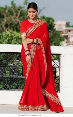 Bollywood Replica SareeBollywood Model Red color pooja wear saree with Embroidered work and Sanskrit Font embroidered on the border, especially for Pooja and Festive.Blouse as unstitch material.Shipping time is 5-7 days.Buy this Saree at Kollybollyethnics and make your occasion very special !!. With Express Free Shipping and Custom Stitching, Shop Bollywood Model Red color pooja wear saree online at kollybollyethnics from India with free worldwide shipping. Saree Fancy, Sequence Saree, Lace Saree, Ready To Wear Saree, Indian Wedding Wear, Party Kleidung, Red Saree, Wear Saree, Work Sarees