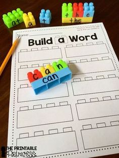 the word build a word is on top of a sheet of paper