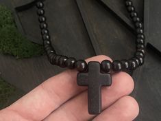 Made by hand from natural ebony wood Black Wooden Beads Rosary Spiritual Style, Black Wooden Beads Spiritual Rosary, Black Wooden Beads Rosary, Black Necklaces With Wooden Beads For Healing, Black Rosary With 108 Beads As Gift, Spiritual Black Rosary With 108 Beads, Men Cross Necklace, Black Rosary, Cross Necklace For Men