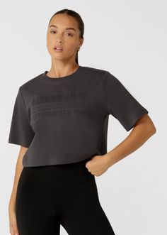 Authentic Classic Tee | Short Sleeve | Lorna Jane USA Gray Relaxed Fit Graphic Tee, Athleisure Cotton Tops With Text Print, Cotton Athleisure Top With Text Print, Graphic Tee With Text Print And Crew Neck, Relaxed Fit Crew Neck Top With Letter Print, Relaxed Fit Crew Neck Tops With Text Print, Gray Relaxed Fit Crew Neck Top, Athleisure Gray Short Sleeve Top, Gray Short Sleeve Top Athleisure