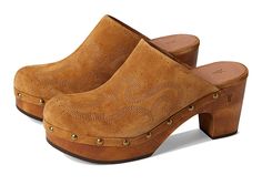 Frye Jessica Clog - Women's Shoes : Brown : Look chic wearing the minimalistic yet fashionable Frye Jessica Clogs featuring hand-burnished wood. Leather upper, lining, and insole. Slip-on style. Antique brass tack detailing for added style. Stitching detail on the vamp. Hand-burnished wood bottoms. Round toes and block heels. Rubber outsole with added traction. Imported. Measurements: Heel Height: 3 1 4 in Weight: 1 lb 2 oz Platform Height: 1 1 4 in Product measurements were taken using size 9, Western Leather Clogs With Round Toe, Western Brown Leather Clogs, Western Style Brown Leather Clogs, Brown Platform Clogs For Fall, Fall Platform Closed Toe Clogs, Closed Toe Platform Clogs For Fall, Fall Leather Platform Clogs, Brown Womens Shoes, Studded Clogs