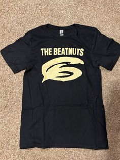 Men's The Beatnuts t-shirt. Screen printed on Gildan Softstyle shirts. Band Logo T-shirt For Fans, Band Logo T-shirt For Fan Merchandise, Band Logo T-shirt Fan Apparel, Urban Band Logo T-shirt For Fans, Urban Band Logo T-shirt For Fan Merchandise, Urban Band Logo T-shirt For Fan Gear, Urban Style T-shirt With Band Logo, Band Logo T-shirt For Streetwear, Streetwear Band Logo T-shirt