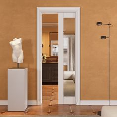 a room with an open door and a white sculpture on the floor next to it