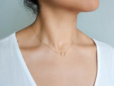 "Our dainty Karma Circle Necklace is the perfect necklace for minimalists. You can pick from a small or big circle to fit your style! Perfect for daily wear. Makes a great gift for your loved ones, and even yourself. Simple, dainty, and minimal necklace. . . . . . . . . . . . . . . . . . . . . . . . . . . . . . . . . . . . . . . . . . . DETAILS + Necklace lengths: 14\" with 2\" extender + 10mm charm + 14k gold filled -or- sterling silver chain, spring clasp, and findings LAYERED NECKLACE DETANGL Minimalist 14k Gold Open Circle Necklace, Simple Open Circle Necklace For Gifts, Simple Open Circle Necklace For Gift, Delicate Open Circle Necklace For Gift, Dainty Everyday Charm Necklaces With Open Circle, Dainty Open Circle Charm Necklaces For Everyday, Minimalist Open Circle Charm Necklace With Adjustable Chain, 14k Gold Minimalist Jewelry As Bridesmaid Gift, Dainty Circle Charm Necklace With Delicate Chain