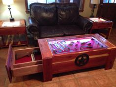 a living room with a leather couch and coffee table