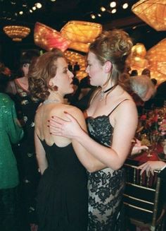 two women embracing each other at a party