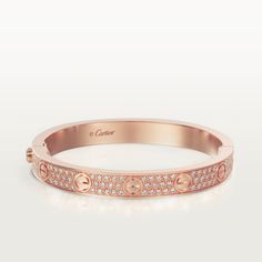 Cartier - LOVE bracelet, diamond-paved - Bracelet Pink gold/Diamond - LOVE bracelet, 18K rose gold (750/1000), set with 204 brilliant-cut diamonds totaling 1.99 carats. Width: 6.7 mm. Thickness: 3 mm (for size 17). Please note that the carat weight, number of stones and product dimensions will vary based on the size of the creation you order. For detailed information please contact us. Cartier Love Bracelet Diamond, Pave Bracelet, Bracelet Diamond, Bracelet Love, Bracelets Gold Diamond, Love Bracelet, Cartier Love, Diamond Bangle, Rose Gold Bracelet