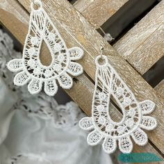 Beautiful embroidered white lace earrings by JOHANNIKA for that special bride! Our whimsical drop earrings come with a silver plated ear wire. They are lightweight and comfortable to wear and include a plastic backing for added security. They can be hand washed and not lose their shape! These romantic JOHANNIKA earrings come in a beautiful presentation and can include a special message. Matching necklace is also available - feel free to contact us. White Teardrop Earrings For Wedding, White Bohemian Filigree Earrings, White Bohemian Teardrop Earrings For Pierced Ears, Delicate White Dangle Teardrop Earrings, Delicate White Dangle Chandelier Earrings, White Bohemian Teardrop Earrings, Delicate White Teardrop Dangle Earrings, White Filigree Dangle Jewelry, White Filigree Drop Earrings