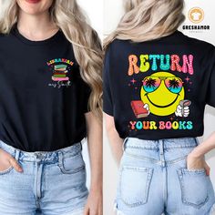 🔥 Celebrate the end of the school year with our "Return Your Books" shirt, specially designed for librarians and reading teachers. This fun and witty tee is perfect for reminding students to bring back their borrowed books before summer break. Customize it with the librarian's name or the school's name to make it a truly personal gift. The shirt features eye-catching graphics of books and a friendly reminder phrase, making it both practical and humorous. Made from comfortable materials, it's id Bookish T-shirt With Funny Print For School, Bookish Letter Print T-shirt For School, School T-shirt With Letter Print In Bookish Style, Bookish Short Sleeve Top For School, Bookish Graphic Print Tops For School, School Tops With Graphic Print In Bookish Style, Short Sleeve Bookish Tops For School, Bookish Text Print Tops For School, Elementary Librarian