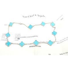 Van Cleef & Arpels 18k White Gold 10 Motif Alhambra Turquoise Necklace Paper  This is an extremely rare, highly collectible turquoise Alhambra necklace by Van Cleef & Arpels*** This necklace comes with service paper from a VCA store and a VCA box.   Metal: 18k white gold  Length: 17" Width:  15mm  Weight: 22 grams  Stones: 10 motifs of Turquoise Alhambra shape stones 15mm each  Hallmarks: VCA 750 BL72405(serial number omitted) T3184orddd  Please reference the dimensions in the description for the best approximate dimensions. Luxury Sterling Silver Turquoise Necklace, Luxury Sterling Silver Necklace In Turquoise, Luxury Turquoise Sterling Silver Necklace, Luxury Round Turquoise Necklace, Luxury Turquoise Gemstone Necklace, Luxury Turquoise Round Necklace, Luxury Turquoise Pendant Jewelry, Luxury Blue Turquoise Gemstone Necklace, Luxury Blue Hallmarked Necklace