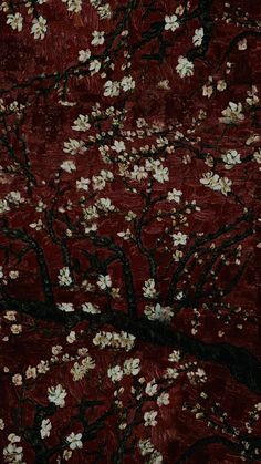 a red background with white flowers and black branches in the foreground is an image of a tree that appears to be blossoming