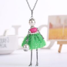 Pink and Green French Doll Multi-Purpose Fashion Jewelry - Necklace - Pendant - Key Chain - Car Accessory  - Xmas Ornament - Gift for Her - Sorority Gift  - Birthday, Anniversary, Holiday Gift Cute Green Necklace For Gifts, Cute Green Necklace For Gift, Cute Pendant Charm Necklace For Party, Cute Pendant Charm Necklaces For Party, Whimsical Pendant Necklaces For Party, Whimsical Pendant Necklace For Party, Whimsical Charm Necklaces For Gift, Party Green Necklaces With Lobster Clasp, Green Necklaces With Lobster Clasp For Party