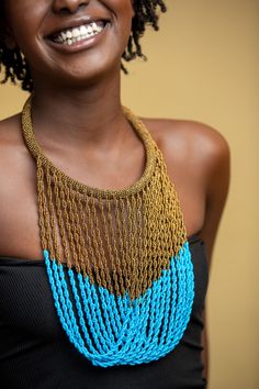 Unique African Maasai Handcrafted Beaded Necklace with an Elegant Look and Brilliant Finish. Circumference = 19 Inches / 50 Centimeters. Color = Teal Blue and Copper. **GET FREE SHIPPING FOR ADDITIONAL ITEMS PURCHASED. Yes, Buy Multiple Items and pay shipping for 1 item only- The rest ships Free. (No Limits on the number of Multiple items). With a faster delivery time of 3 days via DHLExpress, Worldwide. Ordinary/Standard Shipping also available upon request. We Custom Make to Suit Your Taste. A Epoxy Necklace, Flower Epoxy, African Inspired Decor, Woman Necklace, Handmade Beaded Necklace, Boulder Opal Pendant, Beadwork Necklace, African Necklace, Bracelet Accessories