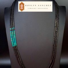 This is an all natural black jet heishi and turquoise heishi necklace w/matching earrings. Three strands with sterling cones and sterling hook and eye clasp. The earrings have sterling silver cones, earring wires, and all natural jet and turquoise heishi. This piece was created by the owner/artisan Native New Mexican - Roslyn Sanchez. Abstract indigenous jewelry. *sterling silver *natural grade AAA jet heishi *natural grade AAA turquoise heishi A Living Stone All Native Americans believe that th Artisan Jewelry With Black Beads, Southwestern Style Jewelry With Black Beads For Gift, Southwestern Style Black Beads Jewelry For Gift, Southwestern Style Black Bead Jewelry For Gifts, Turquoise Polished Heishi Beads Jewelry, Adjustable Southwestern Jewelry With Black Beads, Adjustable Southwestern Style Jewelry With Black Beads, Black Single Strand Bohemian Jewelry, Bohemian Black Single Strand Jewelry