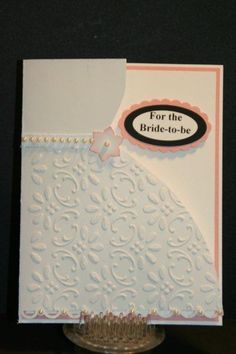 a card with a dress on it and the words for the bride - to - be