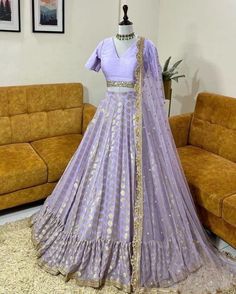 Lilac Lehenga Blouse Custom Stitched Party Wear Indian Outfit  FABRIC DETAILS: >Lehnga made using Embroidered Georgette fabric.  >Blouse is in embroidered silk. These are not real mirrors. >Dupatta is in Net with embroidery lace border on all sides of it. Dupatta is decorated with beautiful foil mirror work all over as shown in the picture. SIZE & STYLE: >You can either choose a standard sizing or Custom Sizing. >Please refer listed image for standard sizing chart. > Custom Regular Size is upto XXL. Above that Size all sizes are considered Plus Size. >All Standard sizes lehenga (Skirt) will be having fixed length 41 inches. Please contact if you want to change the lehenga length. >If you select custom size then we will send you measurements form after your order. And discuss all the custom Fitted Art Silk Gown With Sheer Dupatta, Fitted Art Silk Pre-draped Saree For Wedding, Fitted Sets With Pallu In Georgette, Fitted Art Silk Gown With Zari Work, Fitted Saree-shaped Gown With Cutdana, Fitted Georgette Gown With Zari Work, Fitted Art Silk Gown With Traditional Drape, Fitted Floor-length Sharara With Resham Embroidery, Fitted Art Silk Dress With Cutdana Detailing