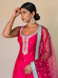 Fidha - Hot Pink Dupion Silk Kurta & Georgette Sharara w/ Floral Embroidery One such color that never runs out of style is pink so slay this contemporary sharara perfect for this bridal season! Product Specifications: Color Hot Pink Fabric Dupion Silk, Georgette & Net Work Floral Embroidery, Sequins & Mirror work Occasion Reception, Engagement, Bridal Style Indo-western Sharara set Care Dry Clean Purchase Includes Kurta, Sharara & Dupatta Kurta: Fabric - Hot pink dupion silk Work - Floral Embroi Western Sharara, Bridal Sharara, Hot Pink Fabric, Georgette Sharara, Mirror Border, Kurta Sharara, Silk Kurta, Wear Store, Dupion Silk