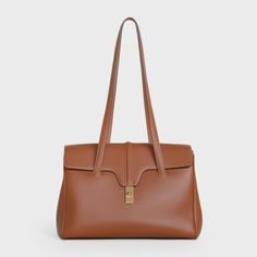 Medium Soft 16 Bag in Smooth Calfskin - Tan - 195543CR4.04LU | CELINE Timeless Gold Satchel For Daily Use, High-end Business Satchel Flap Bag, High-end Satchel Flap Bag For Business, Timeless Gold Satchel For Office, Classic Gold Flap Bag For Business, High-end Brown Shoulder Bag For Office, Timeless Gold Office Satchel, High-end Brown Business Shoulder Bag, Timeless Gold Rectangular Satchel